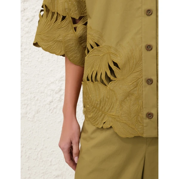 Elevate your elegance in this Zimmermann Tops available now at Coveti