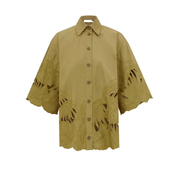 Elevate your elegance in this Zimmermann Tops available now at Coveti
