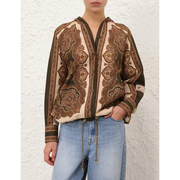Elevate your elegance in this Zimmermann Tops available now at Coveti