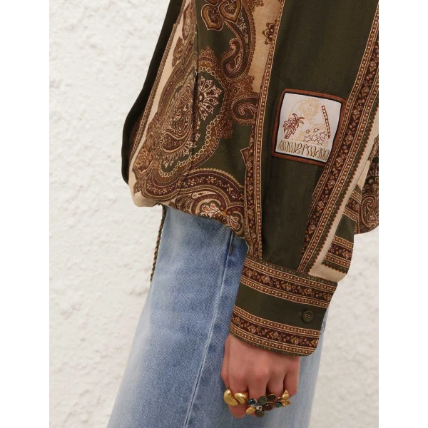 Elevate your elegance in this Zimmermann Tops available now at Coveti