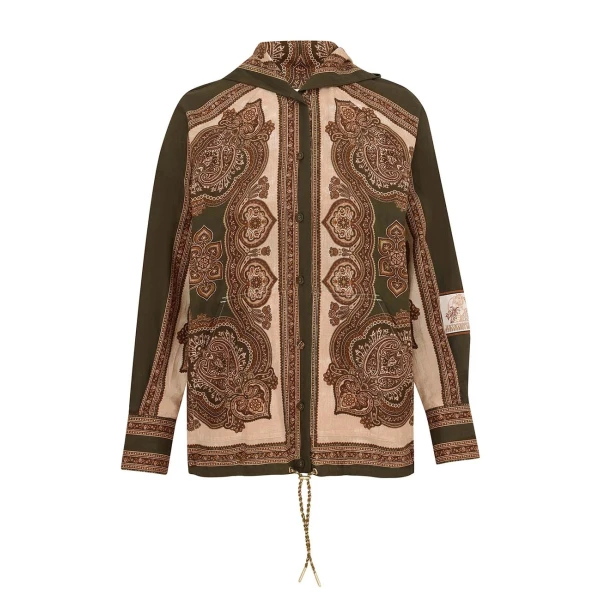 Elevate your elegance in this Zimmermann Tops available now at Coveti