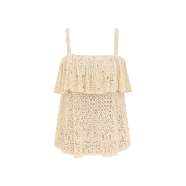 Elevate your elegance in this Zimmermann Tops available now at Coveti