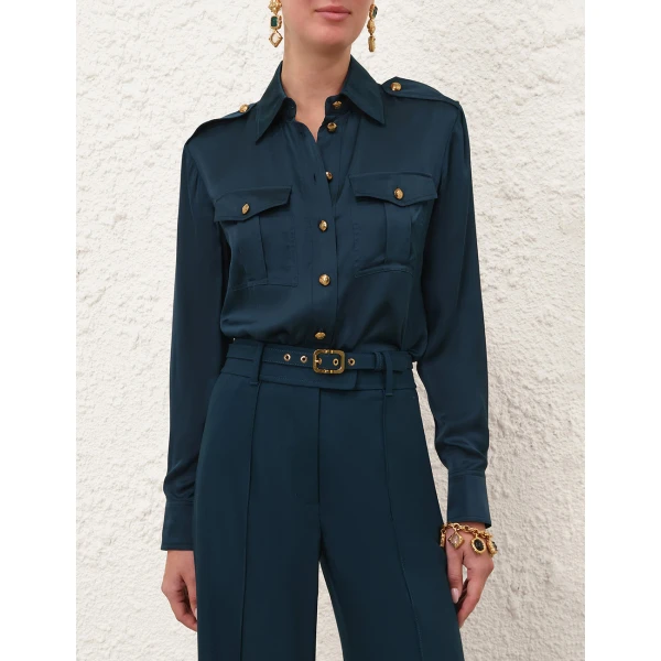 Elevate your elegance in this Zimmermann Tops available now at Coveti
