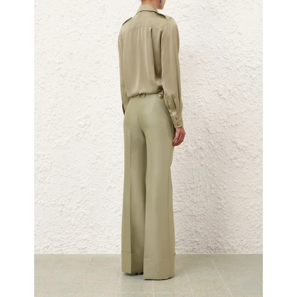 Elevate your elegance in this Zimmermann Tops available now at Coveti