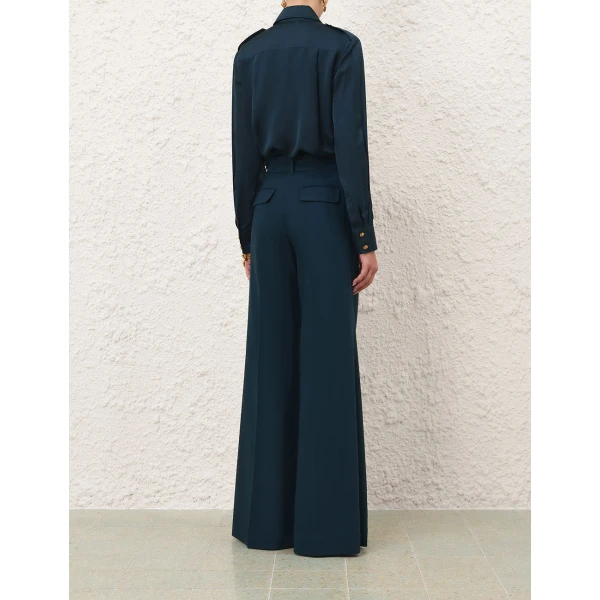 Elevate your elegance in this Zimmermann Tops available now at Coveti