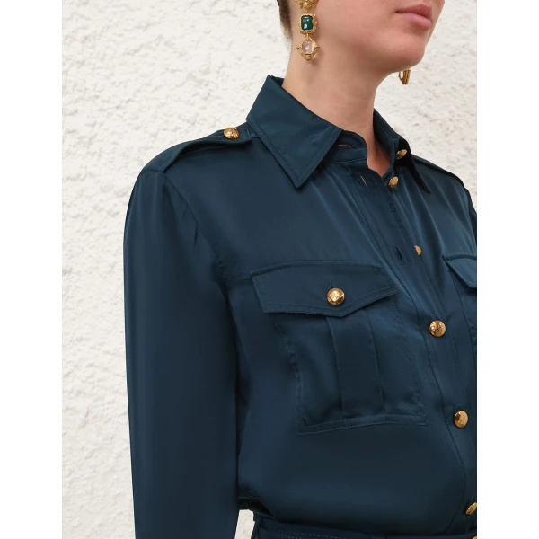 Elevate your elegance in this Zimmermann Tops available now at Coveti
