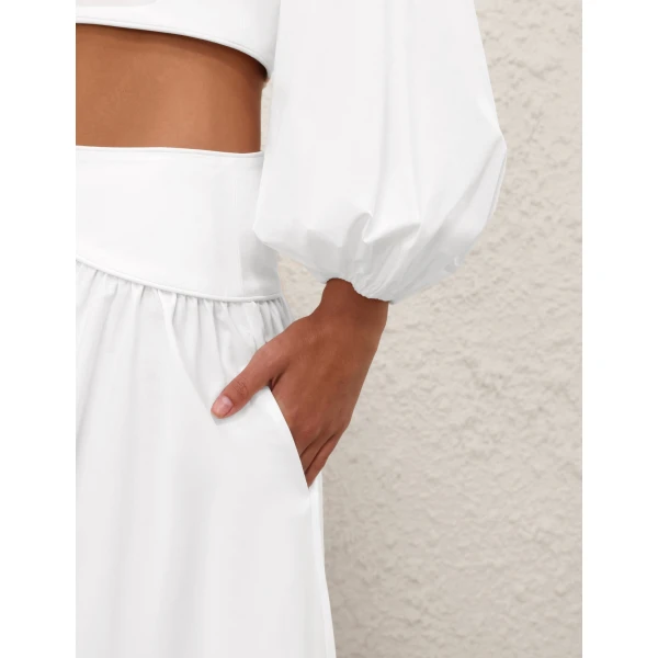 Elevate your elegance in this Zimmermann Tops available now at Coveti