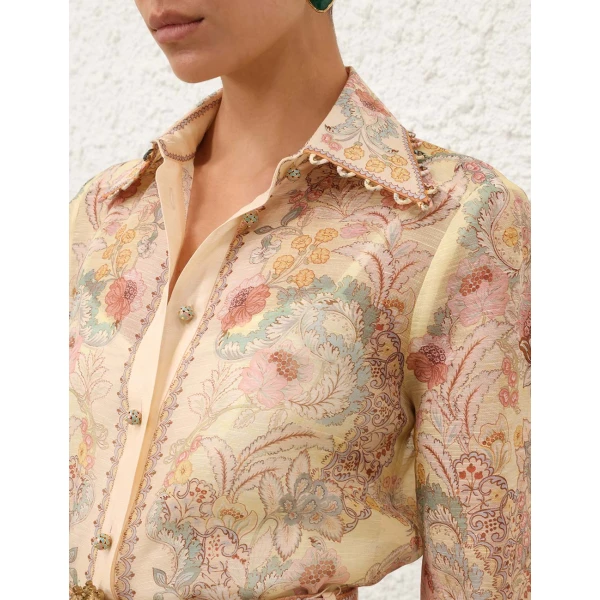 Elevate your elegance in this Zimmermann Tops available now at Coveti