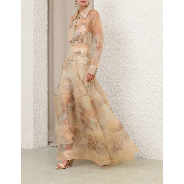 Elevate your elegance in this Zimmermann Tops available now at Coveti