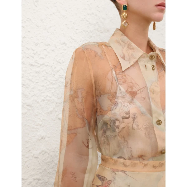 Elevate your elegance in this Zimmermann Tops available now at Coveti
