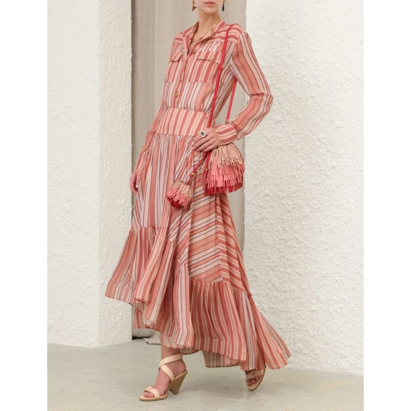 Elevate your elegance in this Zimmermann Tops available now at Coveti