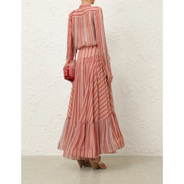 Elevate your elegance in this Zimmermann Tops available now at Coveti