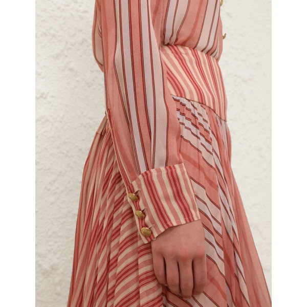 Elevate your elegance in this Zimmermann Tops available now at Coveti