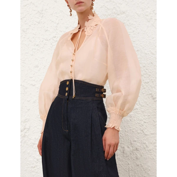 Elevate your elegance in this Zimmermann Tops available now at Coveti