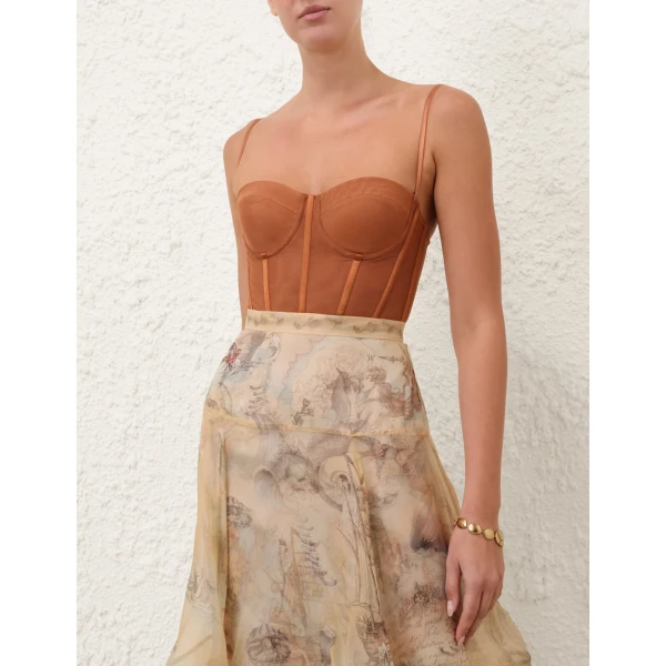 Elevate your elegance in this Zimmermann Tops available now at Coveti