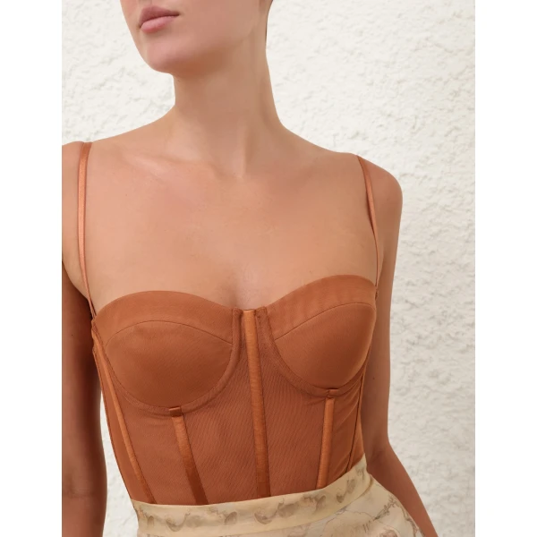 Elevate your elegance in this Zimmermann Tops available now at Coveti