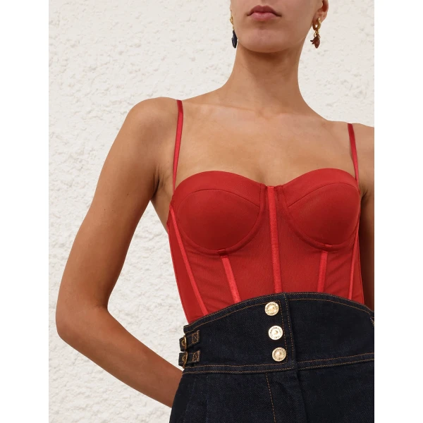 Elevate your elegance in this Zimmermann Tops available now at Coveti