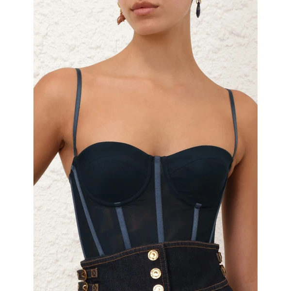 Elevate your elegance in this Zimmermann Tops available now at Coveti