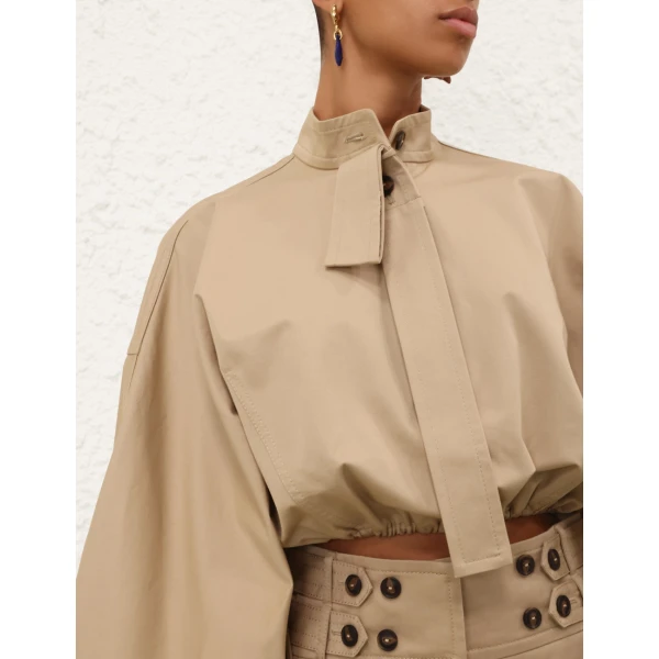 Elevate your elegance in this Zimmermann Tops available now at Coveti
