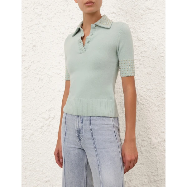 Elevate your elegance in this Zimmermann Tops available now at Coveti