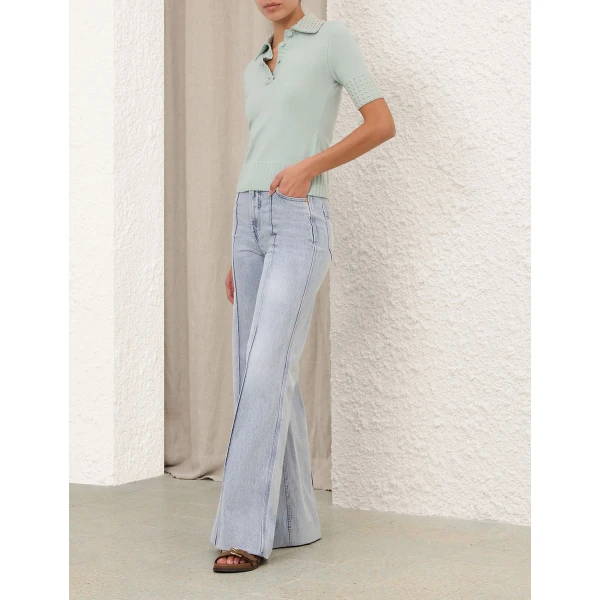 Elevate your elegance in this Zimmermann Tops available now at Coveti