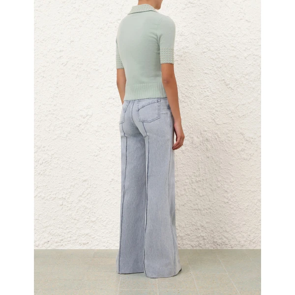 Elevate your elegance in this Zimmermann Tops available now at Coveti