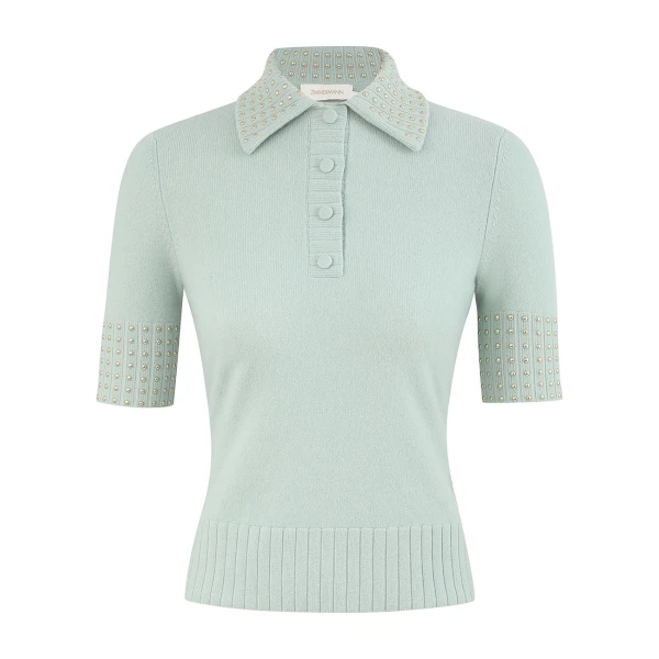 Elevate your elegance in this Zimmermann Tops available now at Coveti