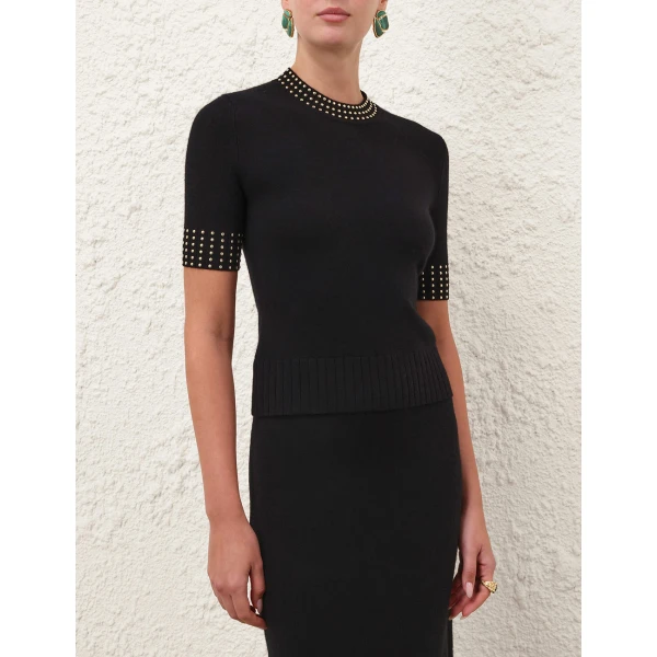 Elevate your elegance in this Zimmermann Tops available now at Coveti