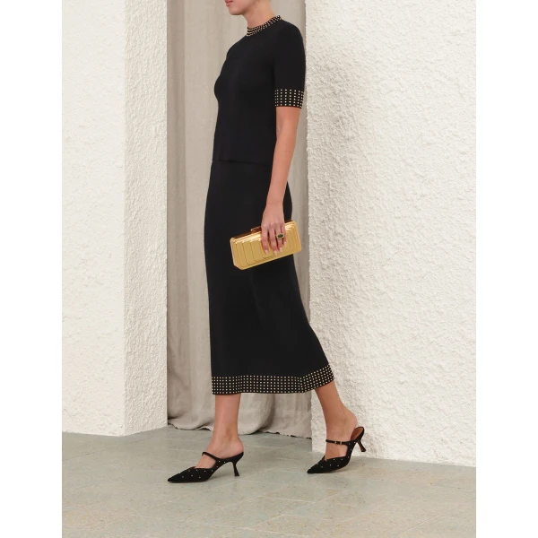 Elevate your elegance in this Zimmermann Tops available now at Coveti