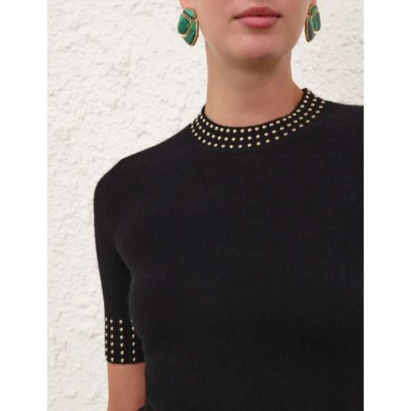 Elevate your elegance in this Zimmermann Tops available now at Coveti