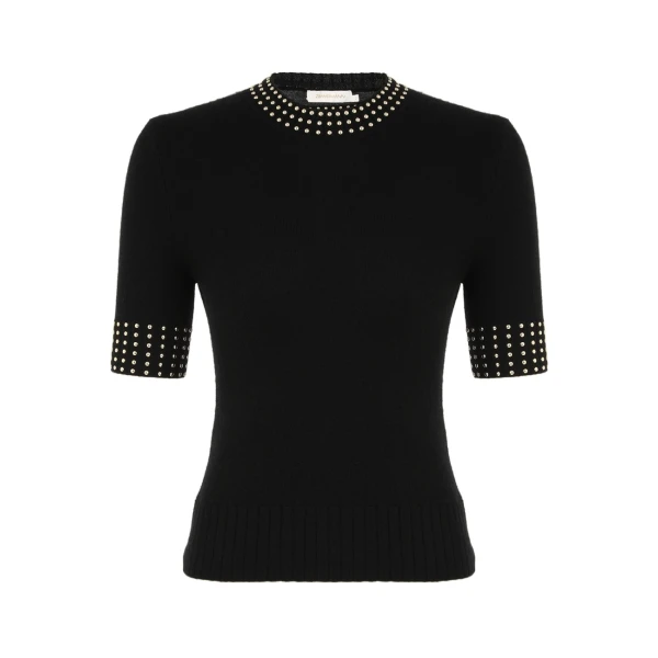 Elevate your elegance in this Zimmermann Tops available now at Coveti