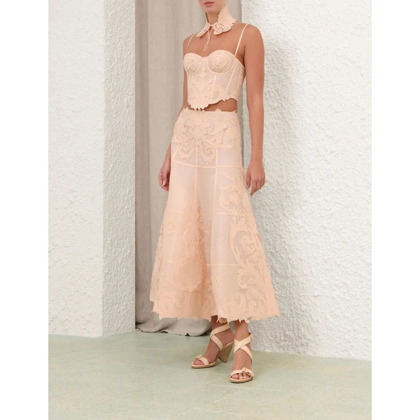 Elevate your elegance in this Zimmermann Tops available now at Coveti