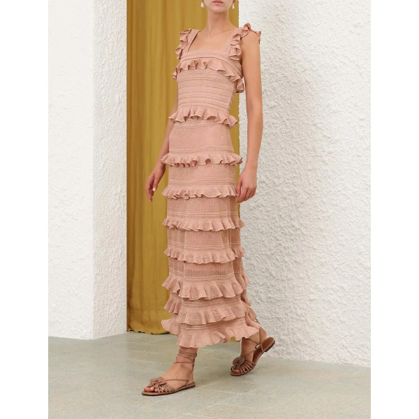 Elevate your elegance in this Zimmermann Tops available now at Coveti