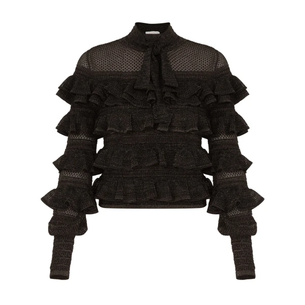 Elevate your elegance in this Zimmermann Tops available now at Coveti