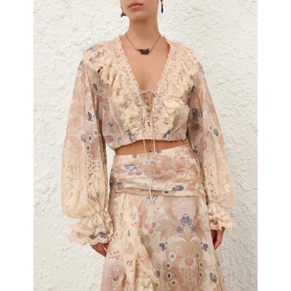 Elevate your elegance in this Zimmermann Tops available now at Coveti