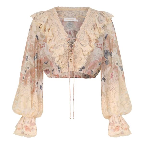 Elevate your elegance in this Zimmermann Tops available now at Coveti