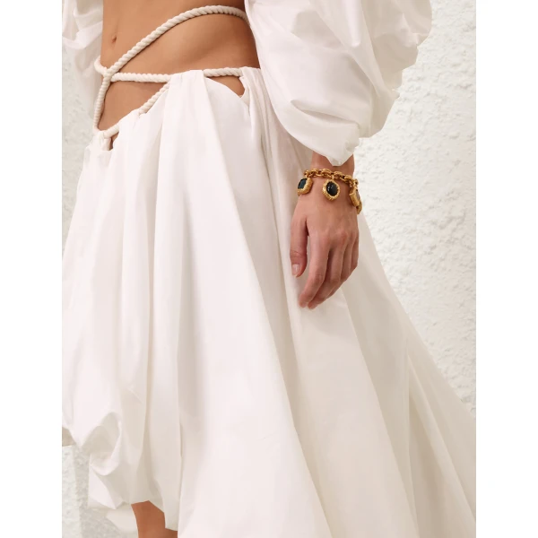 Elevate your elegance in this Zimmermann Skirts available now at Coveti