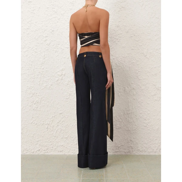 Elevate your elegance in this Zimmermann Bikini available now at Coveti