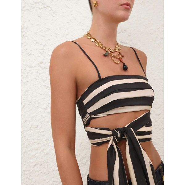 Elevate your elegance in this Zimmermann Bikini available now at Coveti
