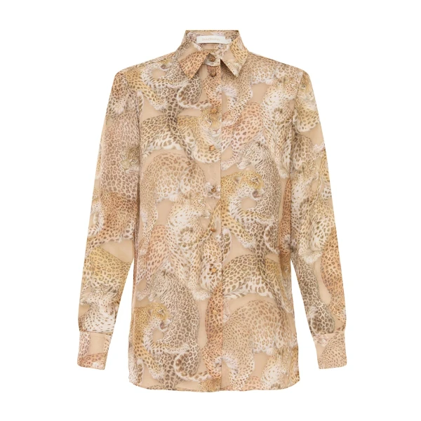 Elevate your elegance in this Zimmermann Tops available now at Coveti