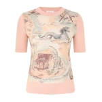 Elevate your elegance in this Zimmermann Tops available now at Coveti