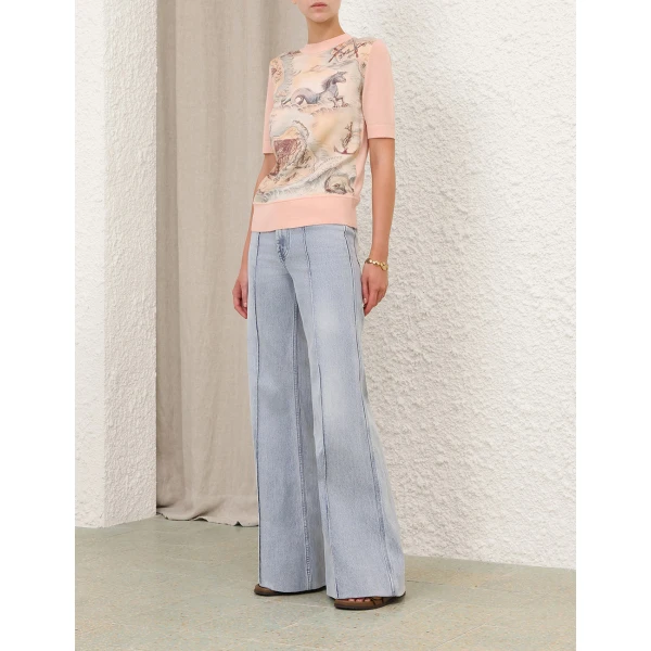 Elevate your elegance in this Zimmermann Tops available now at Coveti