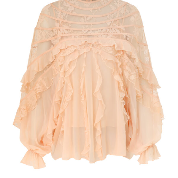 Elevate your elegance in this Zimmermann Tops available now at Coveti