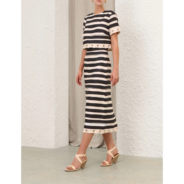 Elevate your elegance in this Zimmermann Tops available now at Coveti