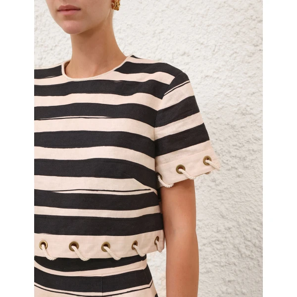 Elevate your elegance in this Zimmermann Tops available now at Coveti