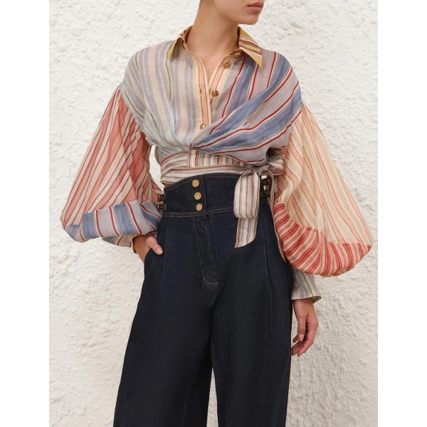 Elevate your elegance in this Zimmermann Tops available now at Coveti
