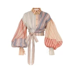 Elevate your elegance in this Zimmermann Tops available now at Coveti