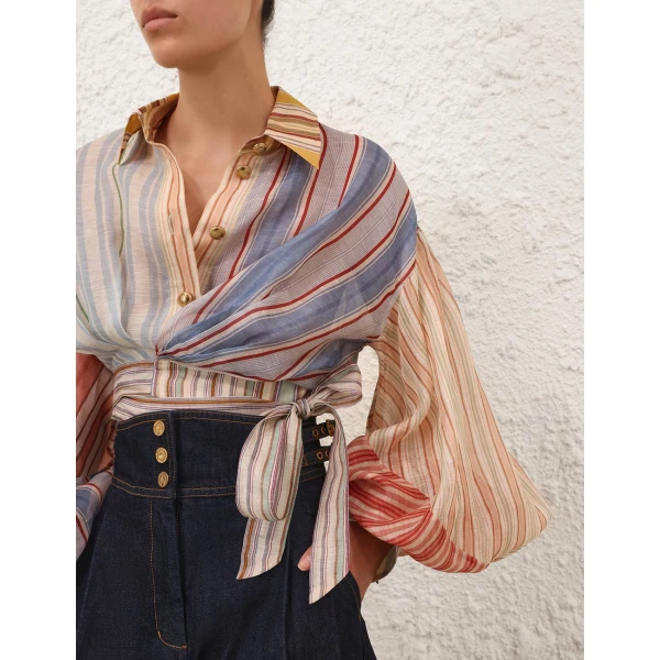 Elevate your elegance in this Zimmermann Tops available now at Coveti