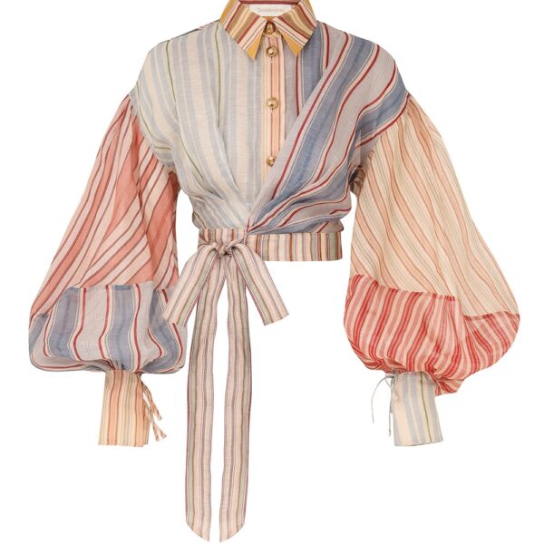 Elevate your elegance in this Zimmermann Tops available now at Coveti