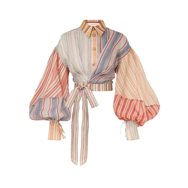 Elevate your elegance in this Zimmermann Tops available now at Coveti